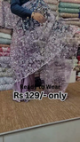 ZZZElegant Purple Net Saree with Intricate Design