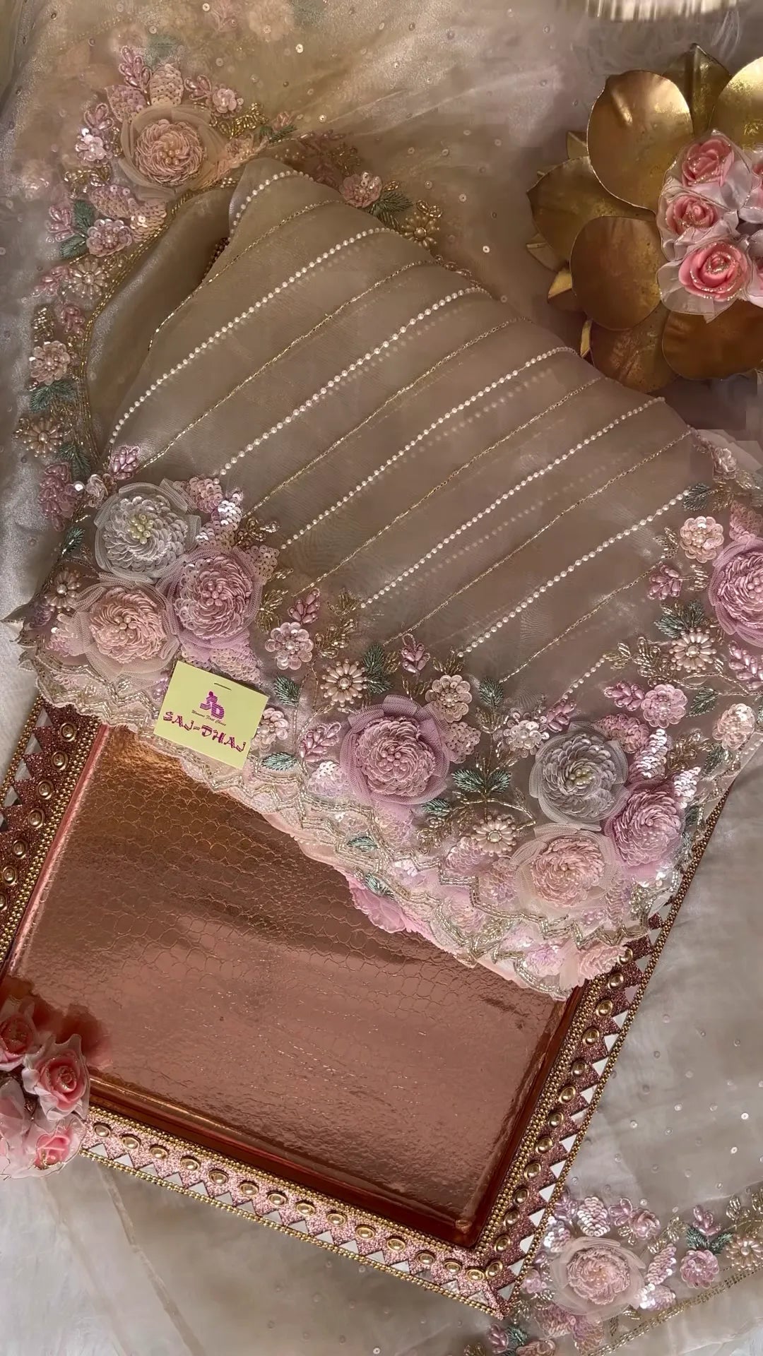 Elegant Embroidered Saree with Floral Motifs and Pearl Accents