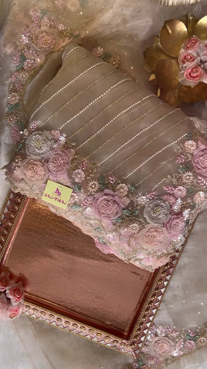 Elegant Embroidered Saree with Floral Motifs and Pearl Accents