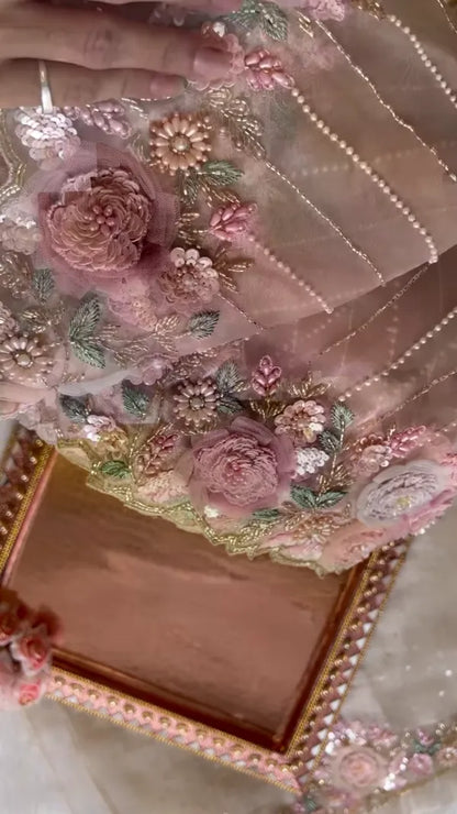 Elegant Embroidered Saree with Floral Motifs and Pearl Accents