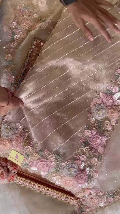 Elegant Embroidered Saree with Floral Motifs and Pearl Accents