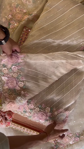 ZZZElegant Embroidered Saree with Floral Motifs and Pearl Accents