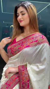ZZZGraceful Elegance: Traditional White Saree with Stunning Pink Pallu